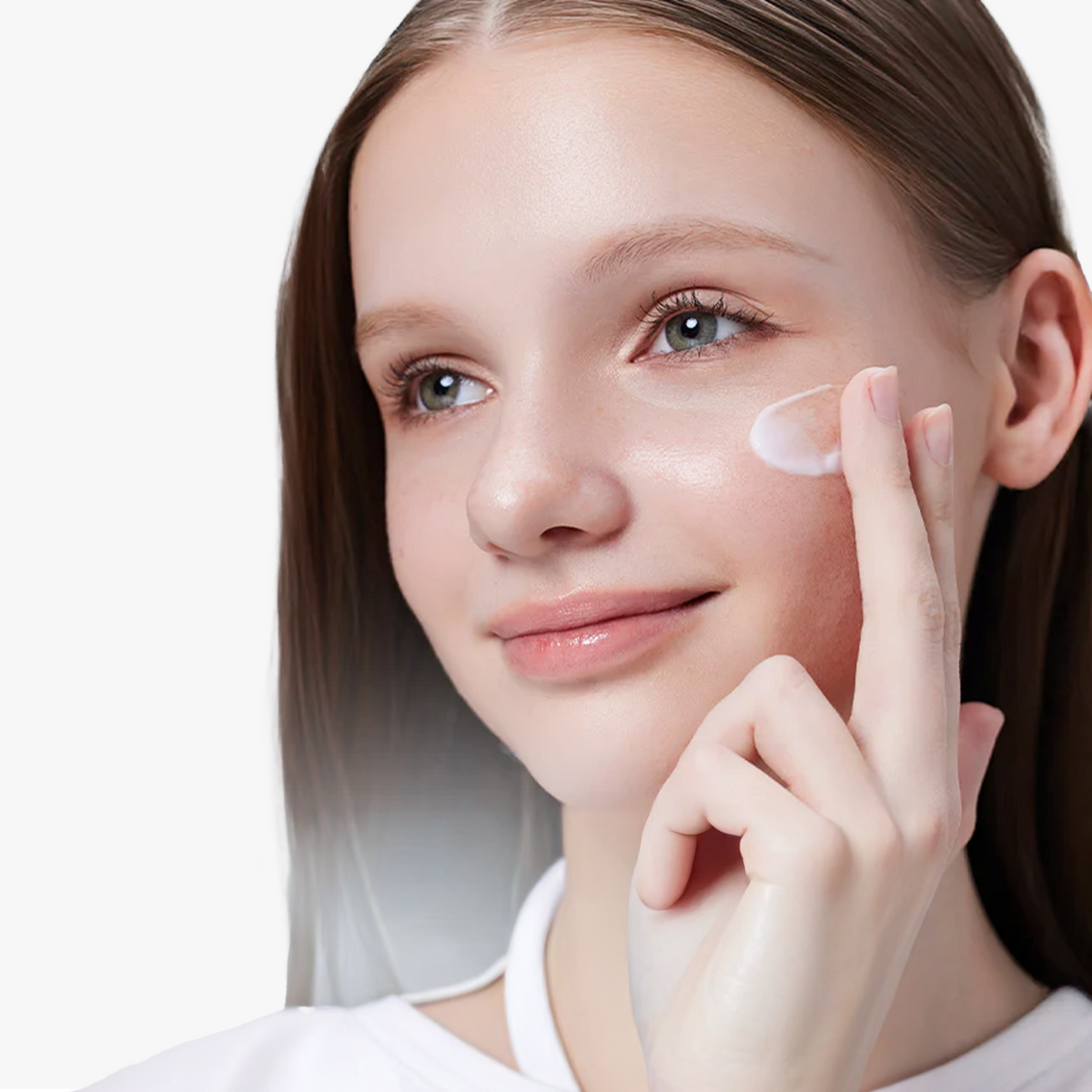 Model gently applying COSRX The Ceramide Skin Barrier Moisturizer to the face, showing the soft cream texture melting into skin for deep hydration and barrier strengthening. Clinically tested for sensitive and dry skin, this lightweight formula provides calm, smooth, and makeup-compatible moisture with proven 12-layer deep hydration within the stratum corneum.