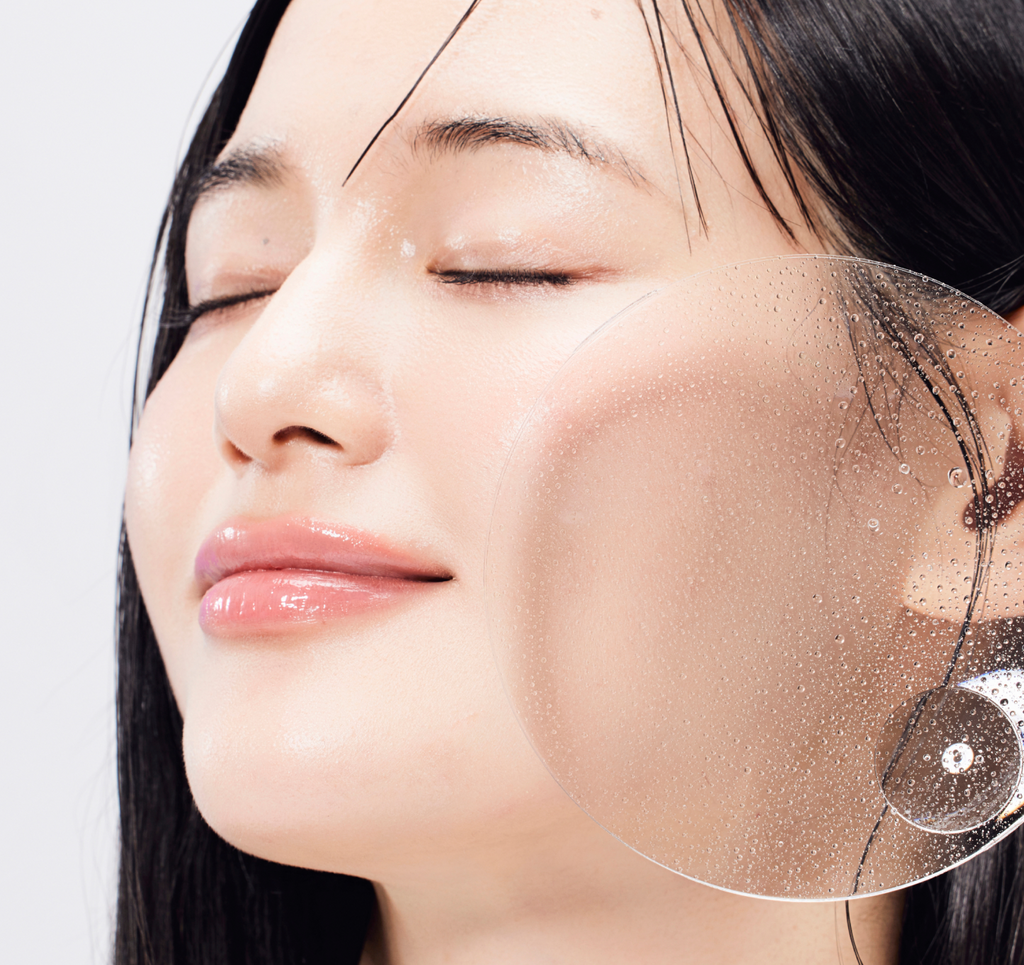 Close-up of hydrated skin after using COSRX The Ceramide Skin Barrier Moisturizing Mist; fine water droplets visible on cheek showing moisture retention and smooth texture, highlighting the mist’s ability to restore glow and comfort to dry or tight skin.
